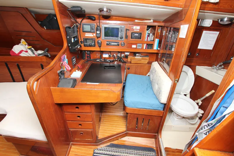 Slide: The Image of Navigation station and cabin interior of 1983 Baltic 38DP sailboat. - 20