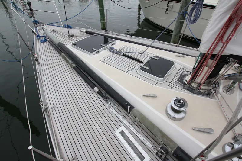 Slide: The Image of 1983 Baltic 38DP sailboat deck with winches and rigging details. - 5