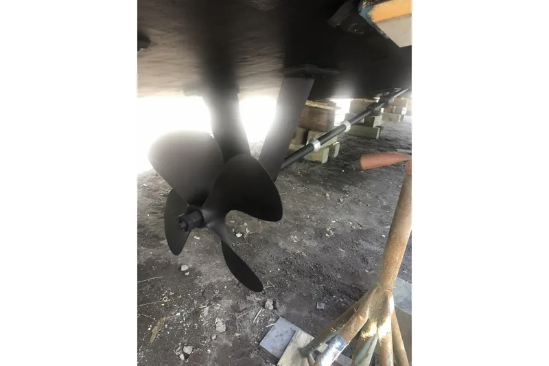 Slide: The Image of Propeller and shaft of a 1990 Californian 52 boat on dry dock. - 12