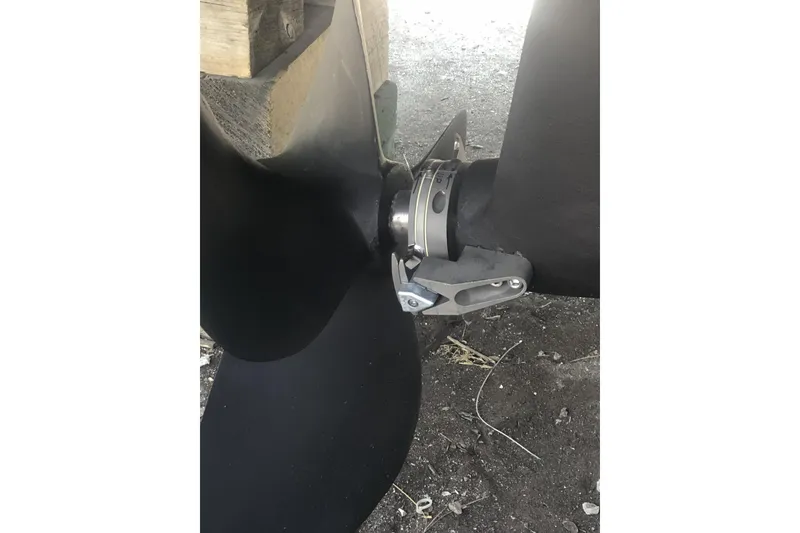 Slide: The Image of Close-up of a 1990 Californian 52 boat propeller on a dry dock. - 13