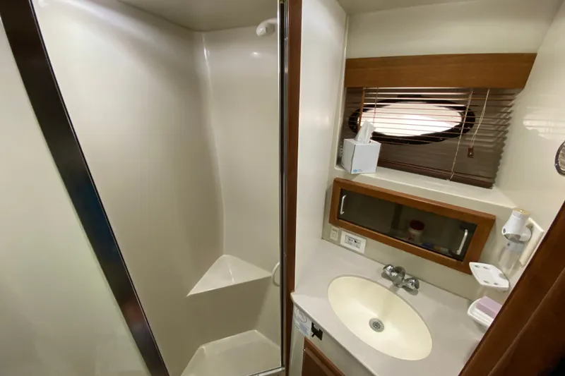 Slide: The Image of Bathroom interior of a 1990 Californian 52 yacht with shower and sink. - 75