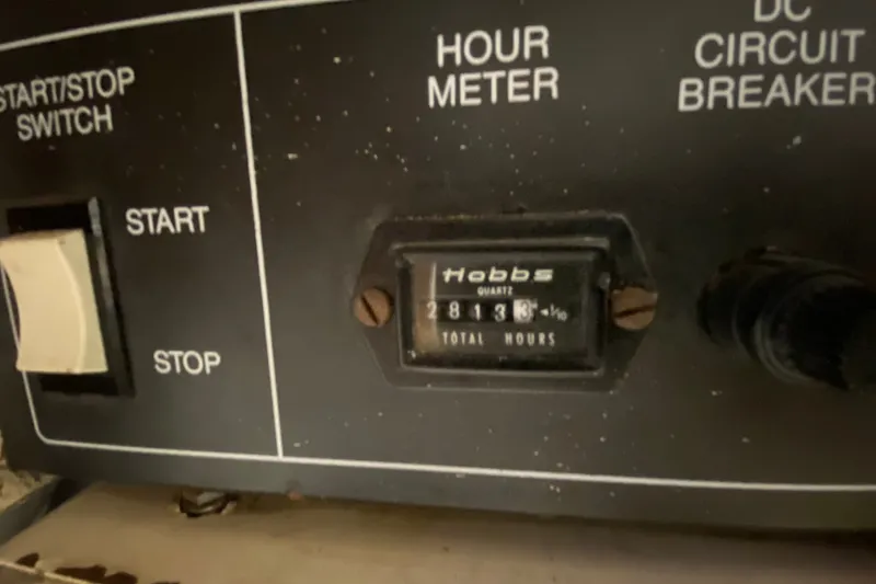 Slide: The Image of Control panel of a 1990 Californian 52 with hour meter reading 2813 hours. - 31