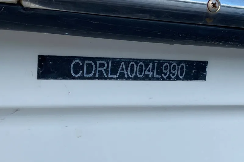 Slide: The Image of Hull identification number on a 1990 Californian 52 boat. - 85