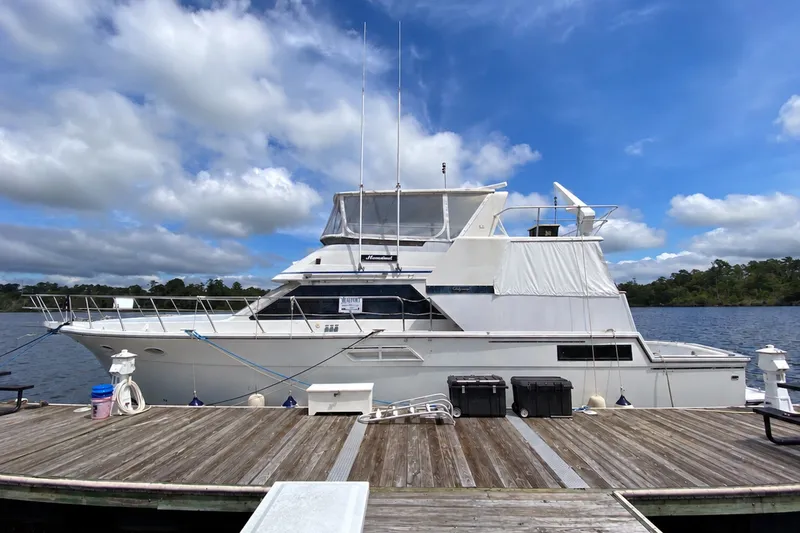 The Image of 1990 Californian 52 Cockpit Motor Yacht docked on a sunny day with blue skies. - 0