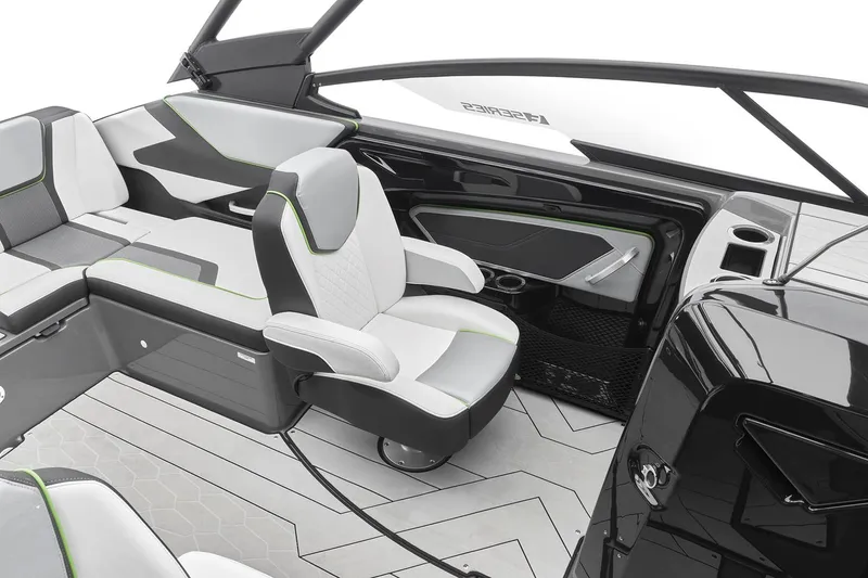 Slide: The Image of 2021 Yamaha Boats 255XD in a garage, front view with trailer. - 12