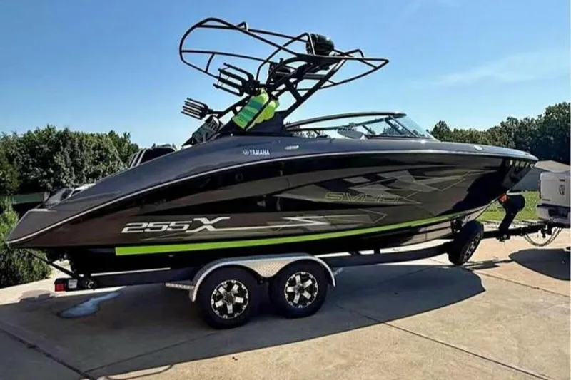 Slide: The Image of Interior of 2021 Yamaha Boats 255XD, featuring modern seating and sleek design elements. - 17