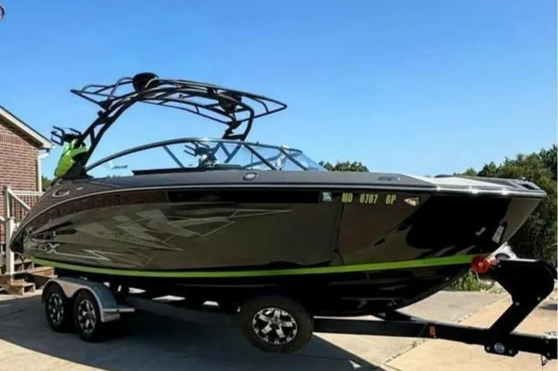Slide: The Image of 2021 Yamaha Boats 255XD interior with modern seating and sleek design. - 19