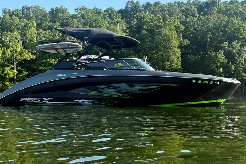 Slide: The Image of 2021 Yamaha Boats 255XD jet propulsion system, showcasing dual engines and mechanical components. - 25