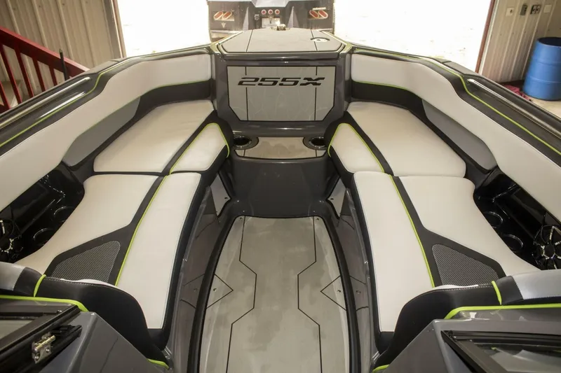 Slide: The Image of 2021 Yamaha Boats 255XD interior with stylish seating and "Making Memories" text. - 26