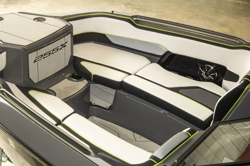 Slide: The Image of 2021 Yamaha Boats 255XD interior with sleek seating and modern design. - 28