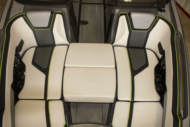 Slide: The Image of Battery compartment of 2021 Yamaha Boats 255XD with wiring and components. - 32