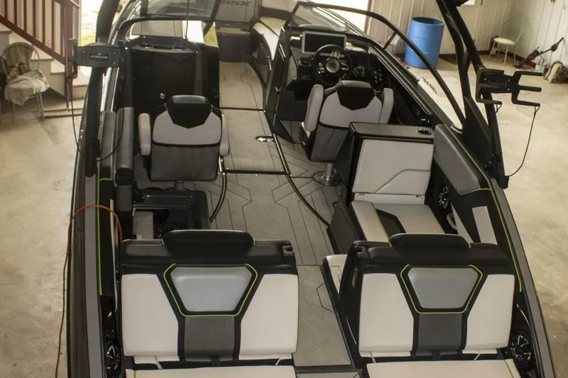 Slide: The Image of 2021 Yamaha Boats 255XD engine compartment with dual engines and wiring. - 35