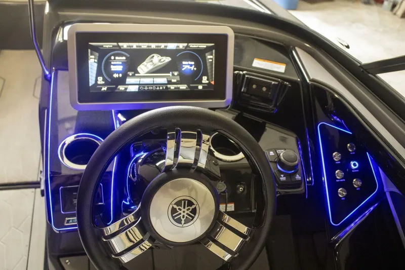 Slide: The Image of Audio system components inside a 2021 Yamaha Boats 255XD, featuring Kicker amplifiers. - 37