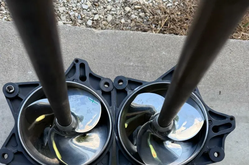 Slide: The Image of 2021 Yamaha Boats 255XD interior with cup holders and sleek design. - 50