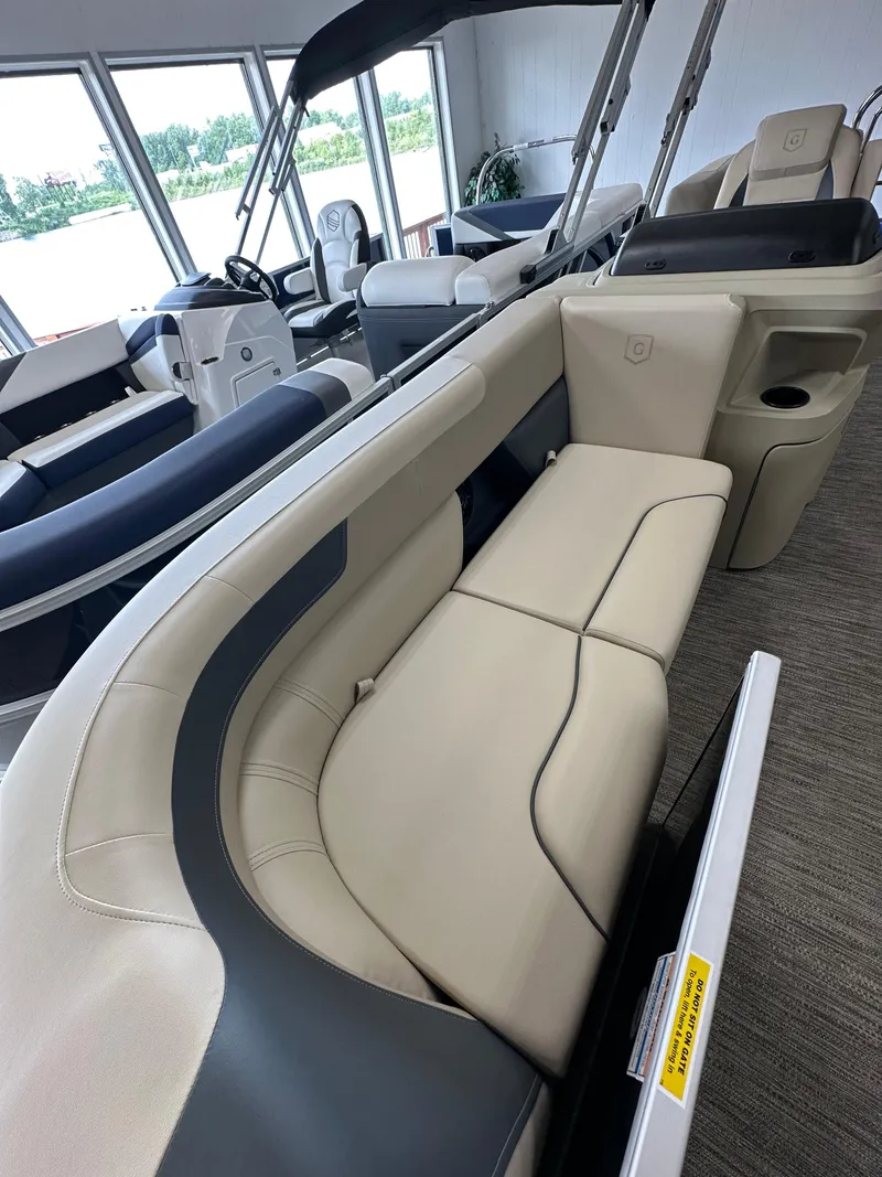 Slide: The Image of Interior of 2025 Godfrey Sweetwater 2086 SBC pontoon boat with beige seating. - 13