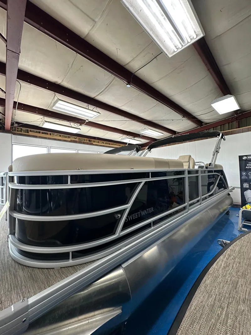 Slide: The Image of 2025 Godfrey Sweetwater 2086 SBC pontoon boat in indoor showroom. - 15