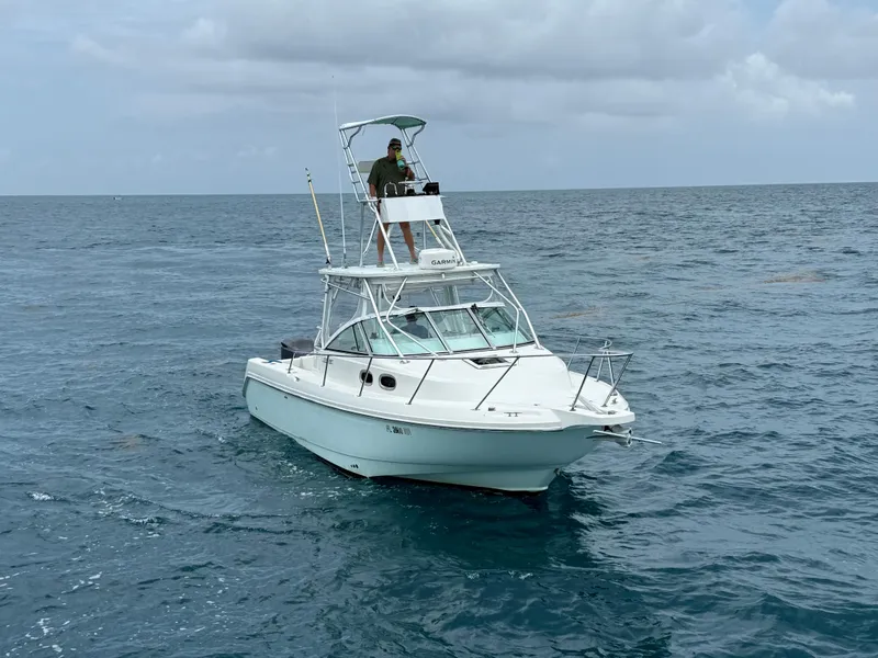 Slide: The Image of Boston Whaler 28 Conquest 2000 on open sea. - 1