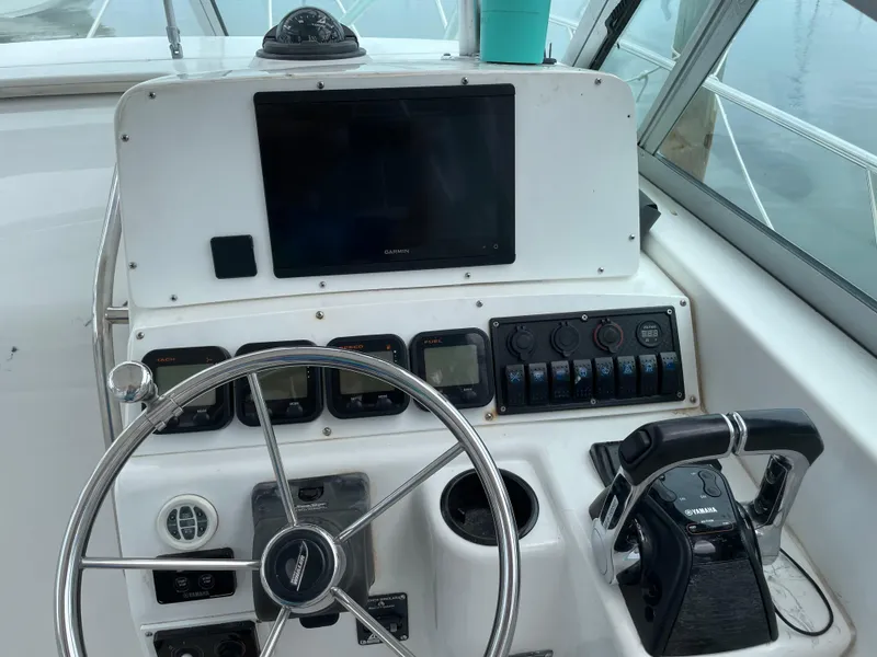 Slide: The Image of Helm console of a 2000 Boston Whaler 28 Conquest. - 6