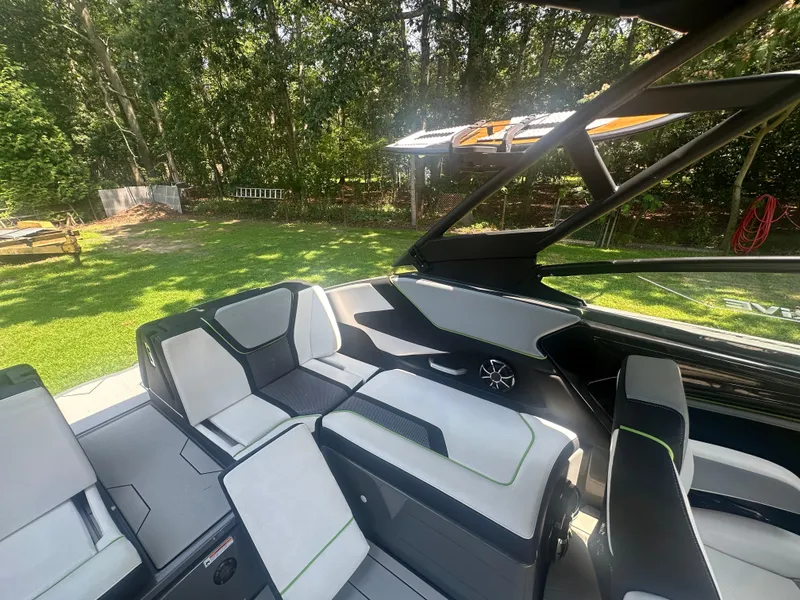 Slide: The Image of 2021 Yamaha Boats 255XD interior with sleek seating and modern design. - 14