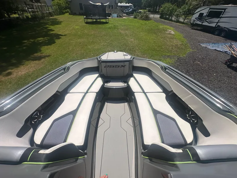 Slide: The Image of 2021 Yamaha Boats 255XD interior with spacious seating and modern design. - 8