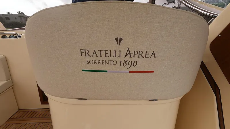 Slide: The Image of Fratelli Aprea Sorrento Cabinatto 32 boat seat with logo and Italian flag, 2023 model. - 20