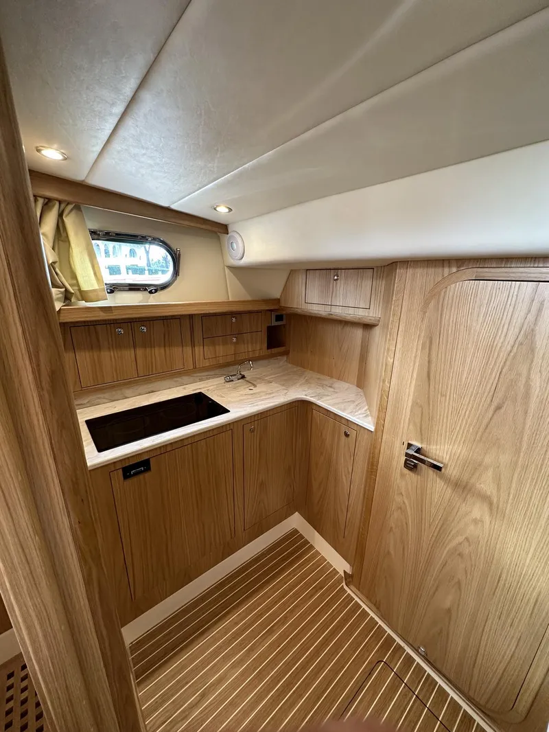 Slide: The Image of 2023 Fratelli Aprea Sorrento Cabinatto 32 interior kitchen area with wooden cabinetry. - 27