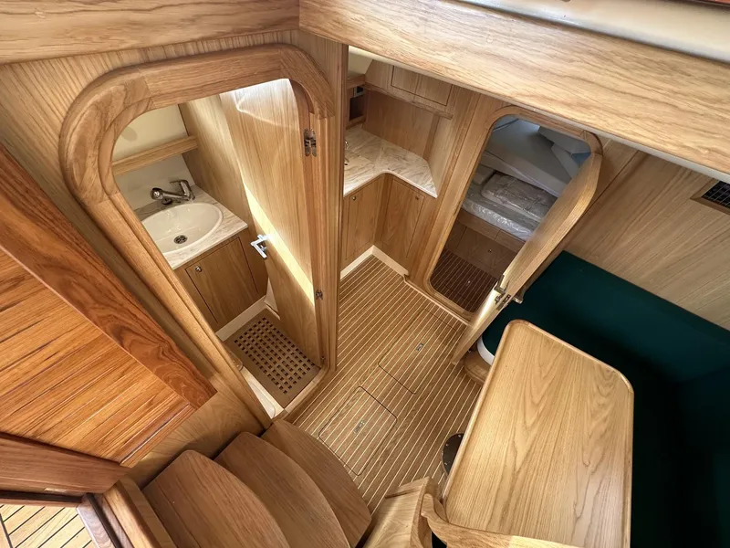 Slide: The Image of Interior of 2023 Fratelli Aprea Sorrento Cabinatto 32, featuring wooden finishes and compact design. - 31