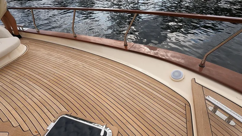 Slide: The Image of Fratelli Aprea Sorrento Cabinatto 32, 2023 model, teak deck detail with water view. - 42