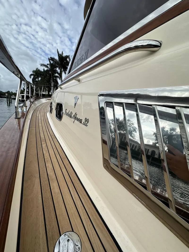 Slide: The Image of 2023 Fratelli Aprea Sorrento Cabinatto 32 yacht with teak deck and chrome accents. - 49