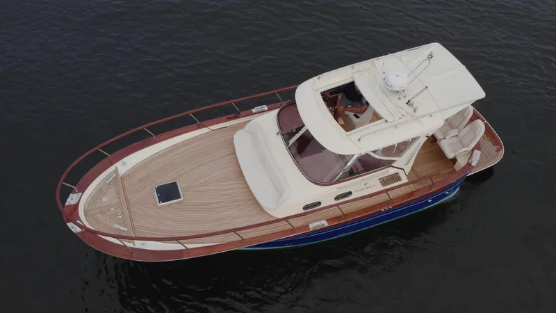 Slide: The Image of 2023 Fratelli Aprea Sorrento Cabinatto 32 luxury boat on water. - 8