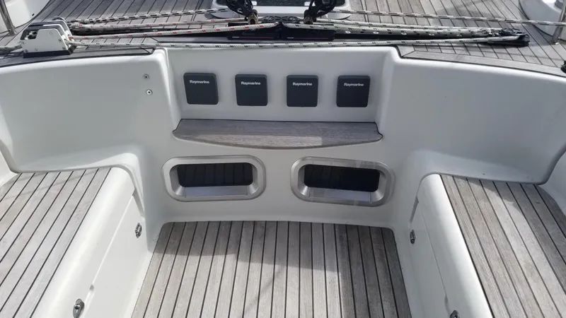 Slide: The Image of Luxurious wooden interior of 2003 CNB 64 yacht, featuring elegant doors and cozy cabin space. - 15