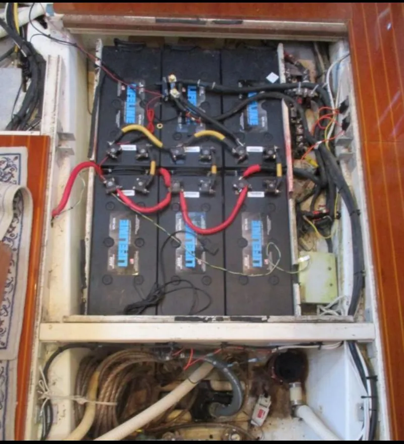 Slide: The Image of CNB 64 sailboat from 2003 on calm water at sunset. - 28