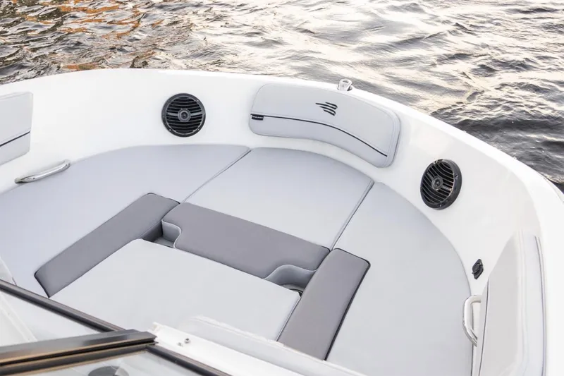 Slide: The Image of 2025 Bayliner VR5 Bowrider OB on trailer, displayed outdoors under clear blue sky. - 3