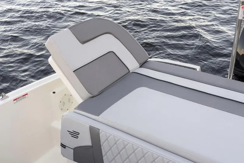 Slide: The Image of 2025 Bayliner VR5 Bowrider OB, sleek design, spacious seating, outdoor display. - 7