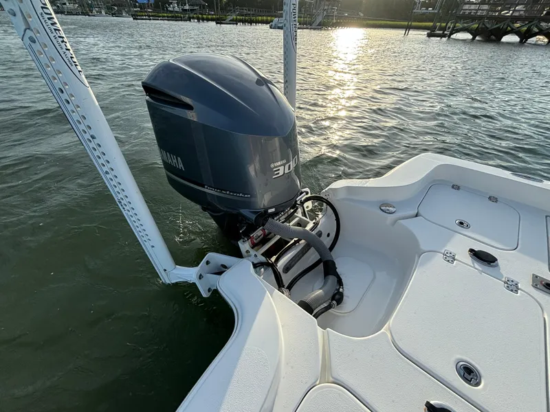 Slide: The Image of 2017 Sea Hunt BX 25 BR boat with Yamaha 300 engine on calm water. - 11