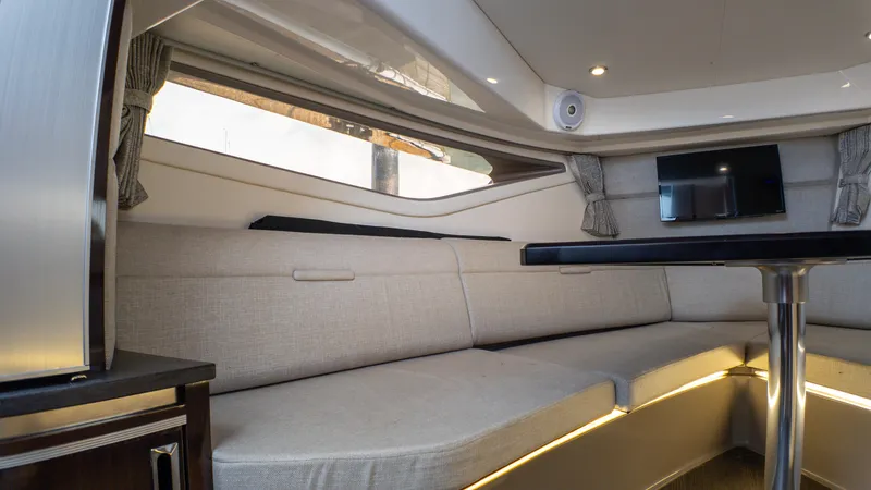 Slide: The Image of Luxurious interior of 2019 Sea Ray Sundancer 320 with cozy seating and modern amenities. - 32