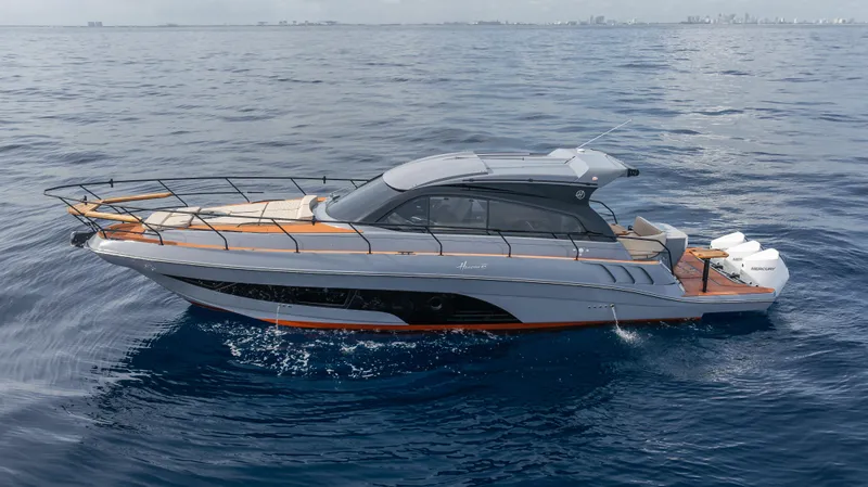 Slide: The Image of Luxurious 2025 Hanover 415 yacht cruising on open sea. - 13