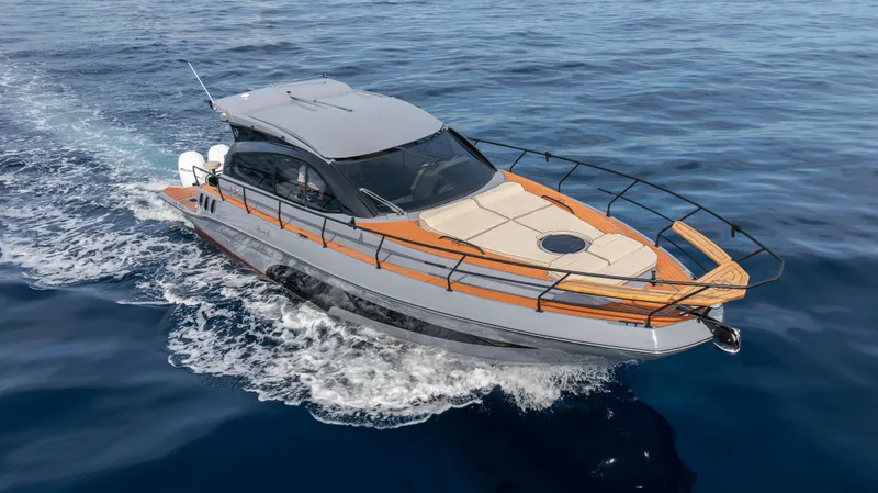 Slide: The Image of 2025 Hanover 415 yacht cruising on open water, showcasing sleek design and luxury features. - 6