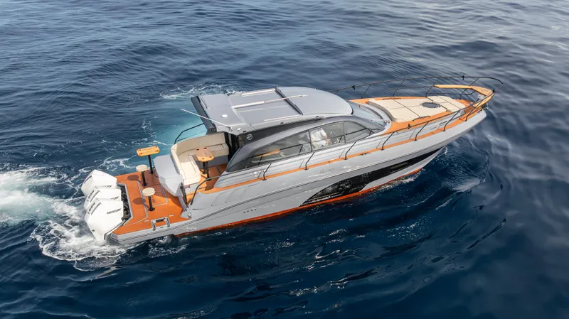 Slide: The Image of 2025 Hanover 415 yacht cruising on open water, showcasing sleek design and luxury features. - 9