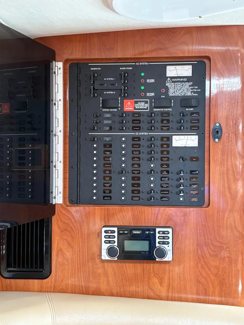 Slide: The Image of Electrical control panel on a 2005 Four Winns 328 Vista Cruiser boat. - 5