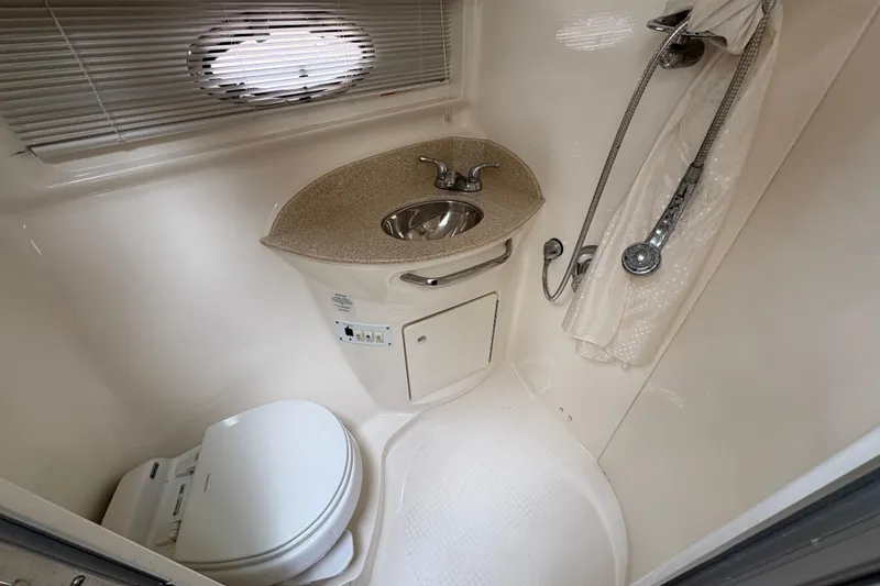 Slide: The Image of 2006 Chaparral Signature 350 bathroom with sink, toilet, and shower. - 21
