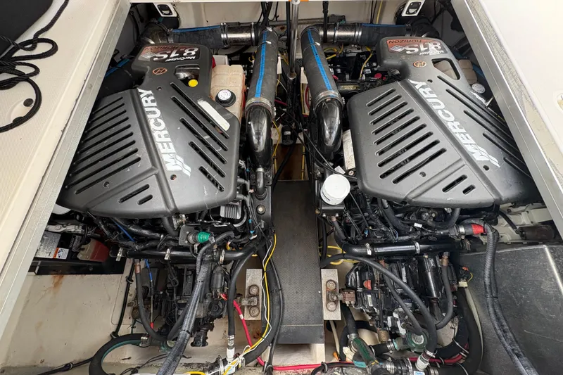 Slide: The Image of Engine compartment of a 2006 Chaparral Signature 350 with dual Mercury engines. - 22