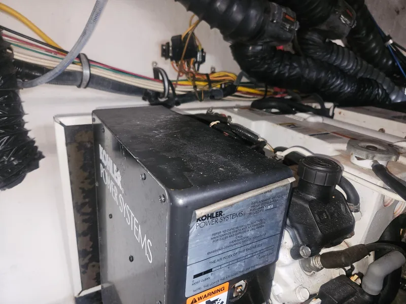 Slide: The Image of Engine room of 2006 Chaparral Signature 350 with Kohler power system. - 23