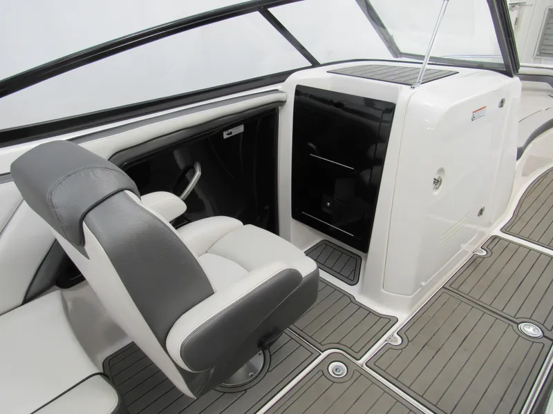 Slide: The Image of 2018 Yamaha Boats AR240 interior with sleek seating and modern dashboard design. - 5