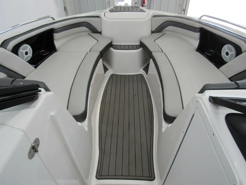 Slide: The Image of 2018 Yamaha AR240 boat interior with sleek seating and modern design. - 7