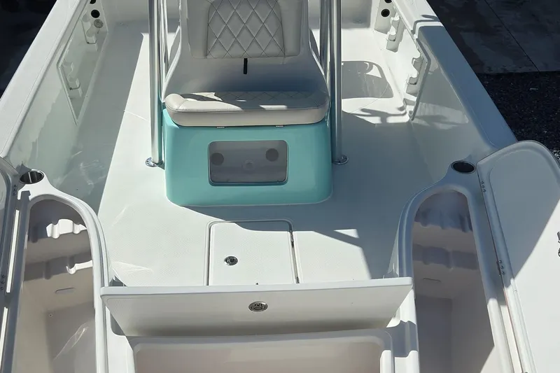 Slide: The Image of 2026 Blazer PureBay 2400 boat interior with seating and storage compartments. - 20