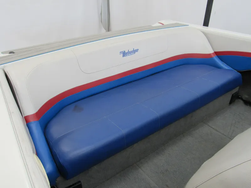 Slide: The Image of 1993 Hydrodyne Comp boat seat with blue, red, and white upholstery. - 10