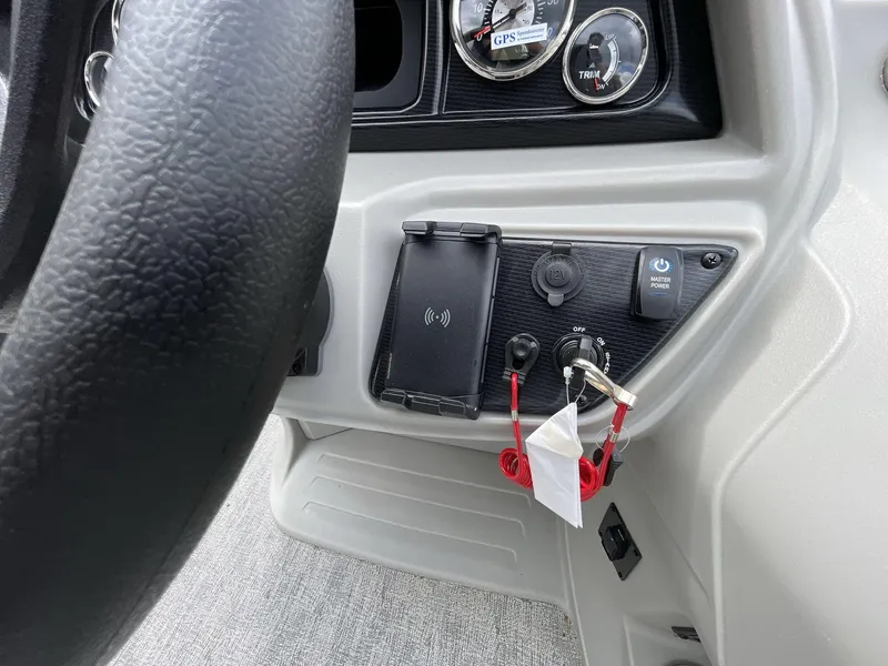 Slide: The Image of 2025 South Bay 222RSLE dashboard with steering wheel, gauges, and control panel. - 23