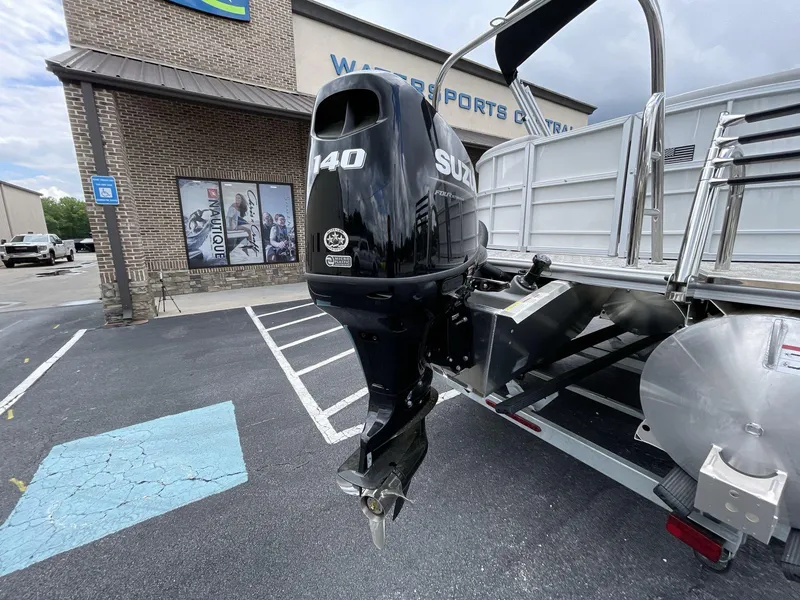 Slide: The Image of 2025 South Bay 222RSLE pontoon boat with Suzuki 140 outboard motor at Watersports Central. - 9