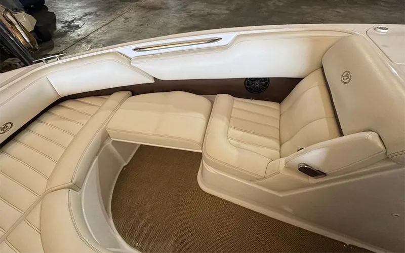 Slide: The Image of Luxurious interior seating of a 2014 Cobalt R5 boat with beige upholstery. - 17